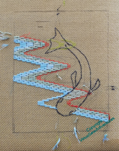 The same canvas as before, now with four rows of stitching in place