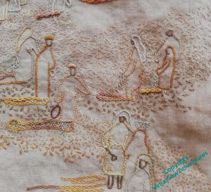 Close of a small section of the View of the Excavation. The small figures of the middle distance are surrounded by seed stitches, with some darker single chain stitches to add weight to the ground.