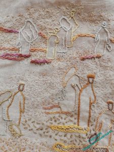 Close up of another mid section of the Excavation. The pale distant figures are surrounded by pale seed stitches, emulating the dust cloud of the title. There are slightly darker stitches surrounding the darker figures of the middle ground, but they may not be quite dark enough, or numerous enough, as yet.