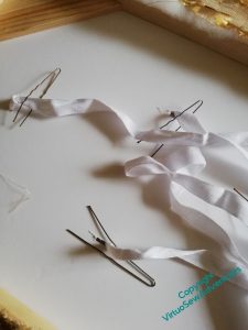Hairpins entangled with cotton tapes