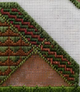 Close up of half of one of the long borders. The Victorian Step Stitch has been continued, but in slightly different colours.