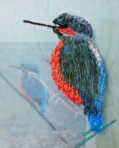 Kingfisher in progress. The bright stripe of his back and tail are in place