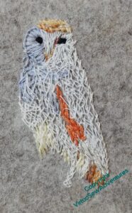 First layer of the barn owl is now in place. It's not quite right, some of the orange is missplaced and the curves aren't quite right. But it is a start.