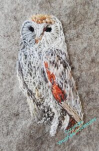 More of the darker elements have been added, although the owl remains footless and almost legless.