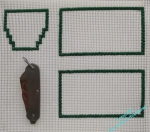 Outlines of canvaswork pieces in Mosaic Stitch, together with the penknife they are going to protect/