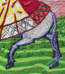 Close up of the horse's rump, with the beginning of the tail in place.