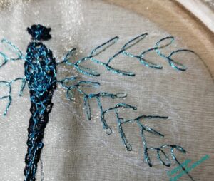 Close up of the dragonfly. It's still hard to see the stitches.