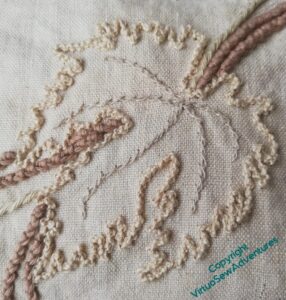 A leaf using Palestrina Knot Stitch and Twisted Chain Stitch