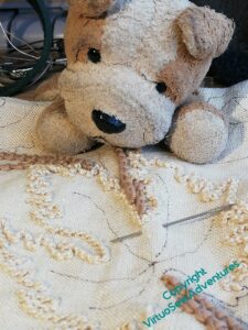 Studio Assistant Harry has a beady eye on my vine leaves.