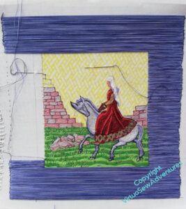 Partially completed blue border around the Aethelflaed Embroidery