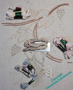 Planning colours for the birds: starting with a variagated "Watercolours" thread (centre) and picking a pearl cotton and a soft cotton in blue (Bitey), pink (Stabby), and cream (Shouty)