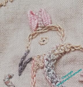 Crest in woven petals